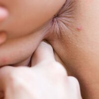 Young woman fingering big clit